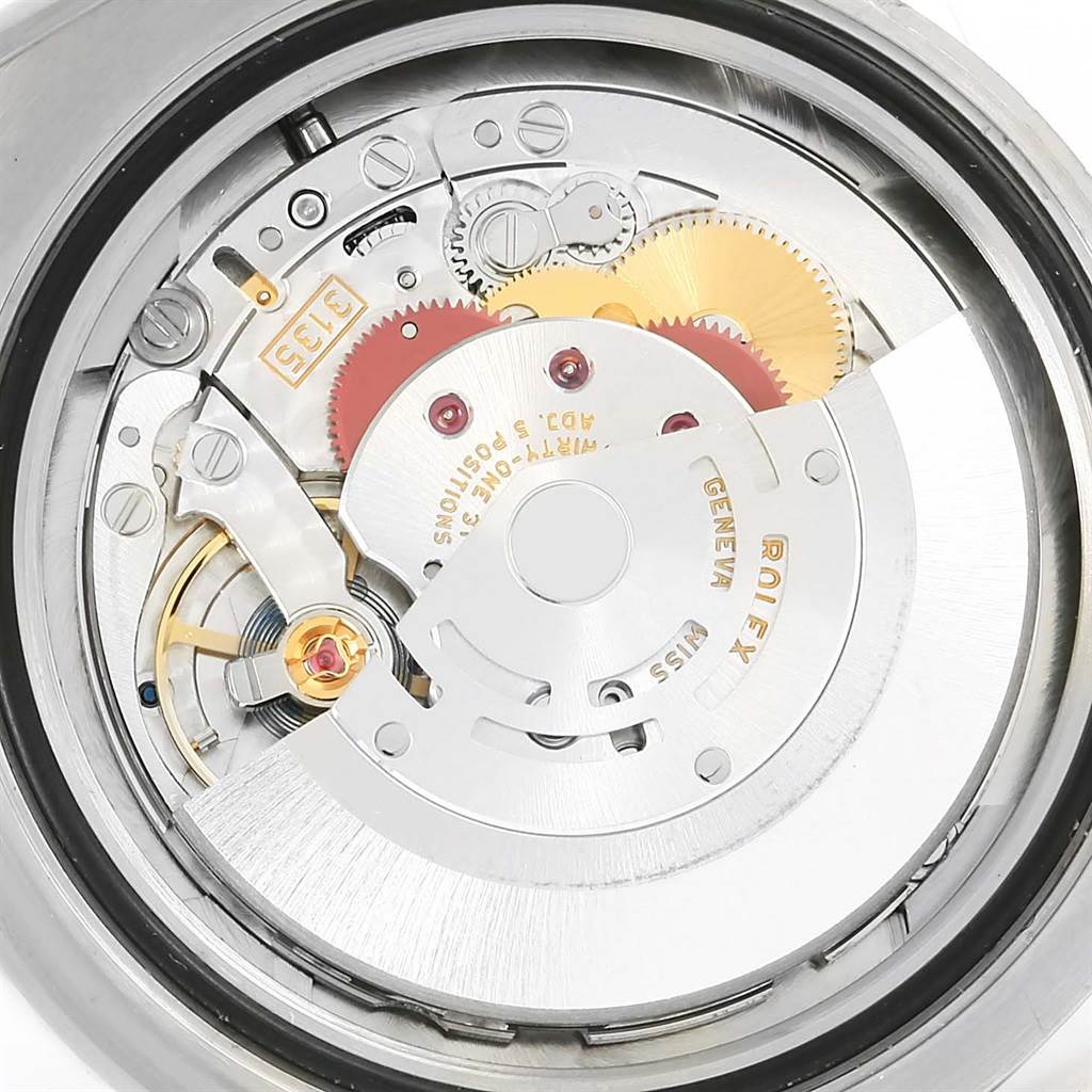 The image shows a close-up view of the movement mechanism inside a Rolex Submariner 116619LB Men's White Gold Blue Dial 116619LB Men's White Gold Blue Dial watch.