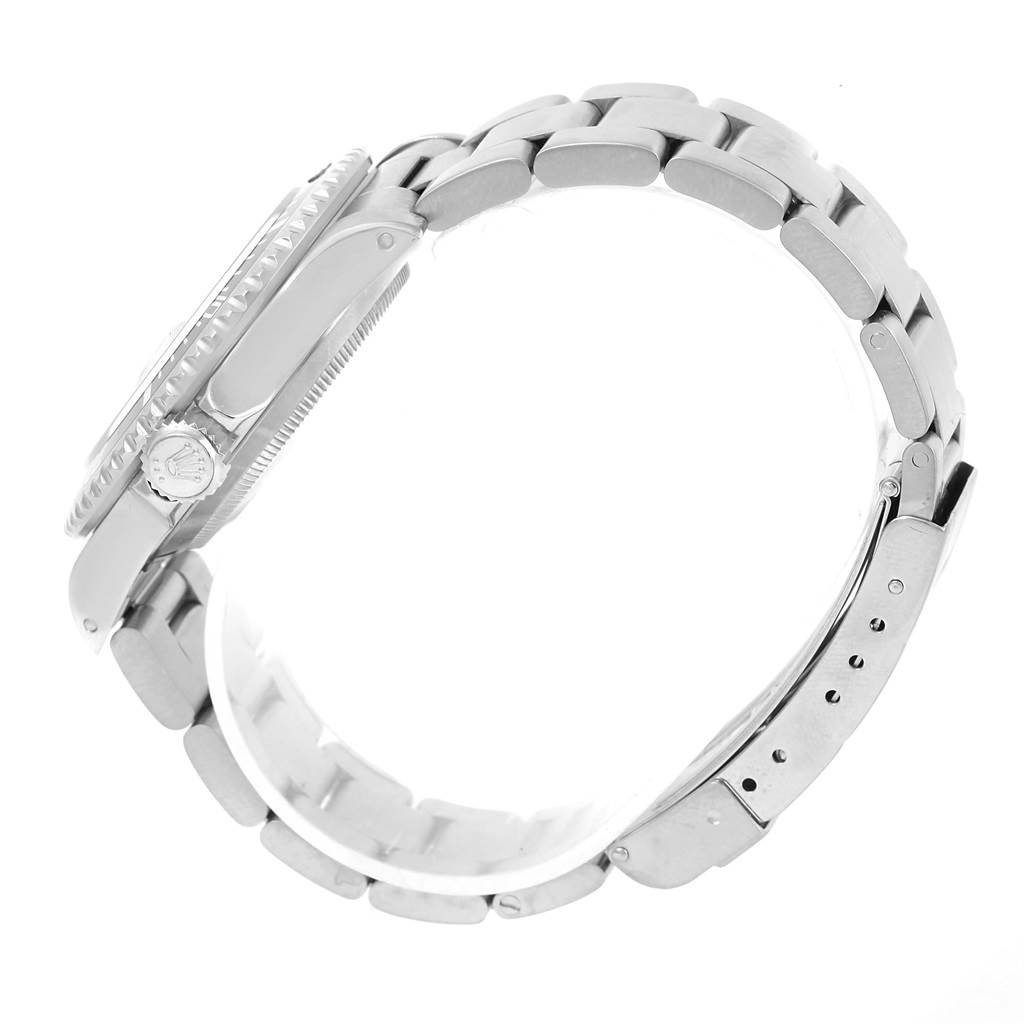 The image shows a side profile of a Rolex Submariner 16610 Men's Stainless Steel Black Dial 16610 Men's Stainless Steel Black Dial watch, highlighting the bracelet, clasp, and crown.