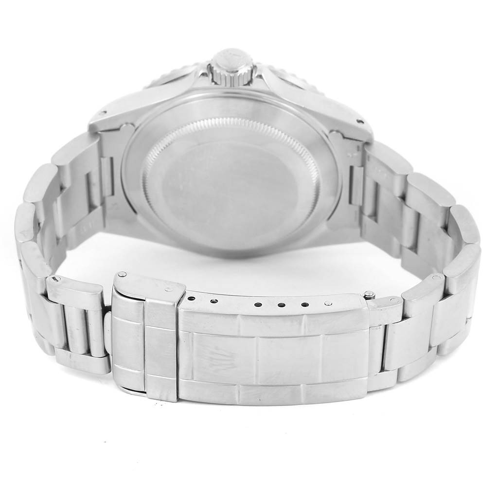 The image shows the back case and bracelet clasp of a Rolex Submariner 16610 Men's Stainless Steel Black Dial 16610 Men's Stainless Steel Black Dial watch.