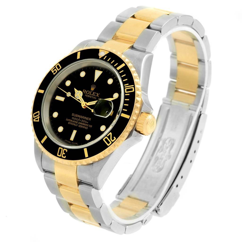 The image shows a Rolex Submariner 16613 Men's Steel and Gold (two tone) Black Dial 16613 Men's Steel and Gold (two tone) Black Dial watch at a slight left-side angle, displaying its dial, bezel, bracelet, and clasp.