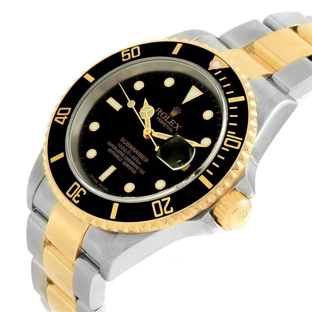 The Rolex Submariner 16613 Men's Steel and Gold (two tone) Black Dial 16613 Men's Steel and Gold (two tone) Black Dial watch is shown from an angled side view, highlighting its black dial, gold bezel, and two-tone bracelet.
