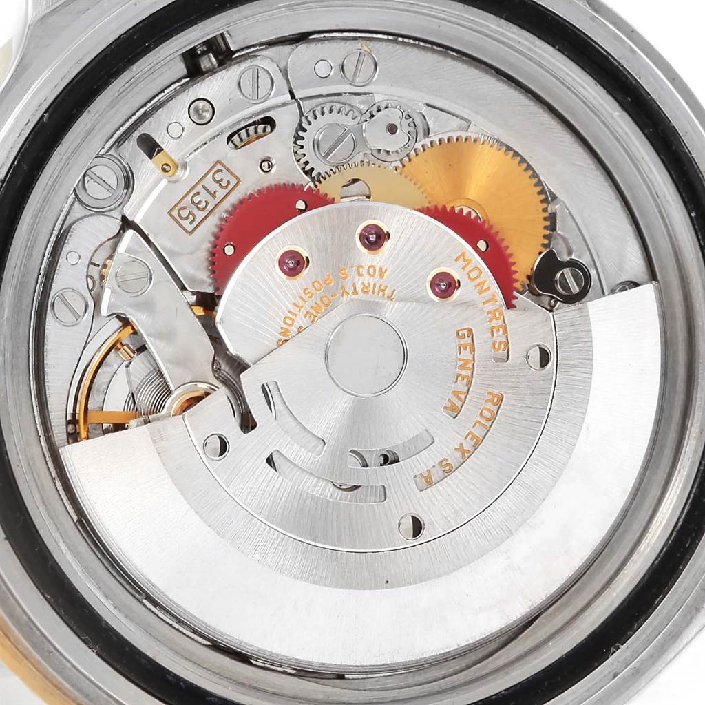 The image shows the detailed internal movement mechanism of a Rolex Submariner 16613 Men's Steel and Gold (two tone) Blue Dial 16613 Men's Steel and Gold (two tone) Blue Dial watch.