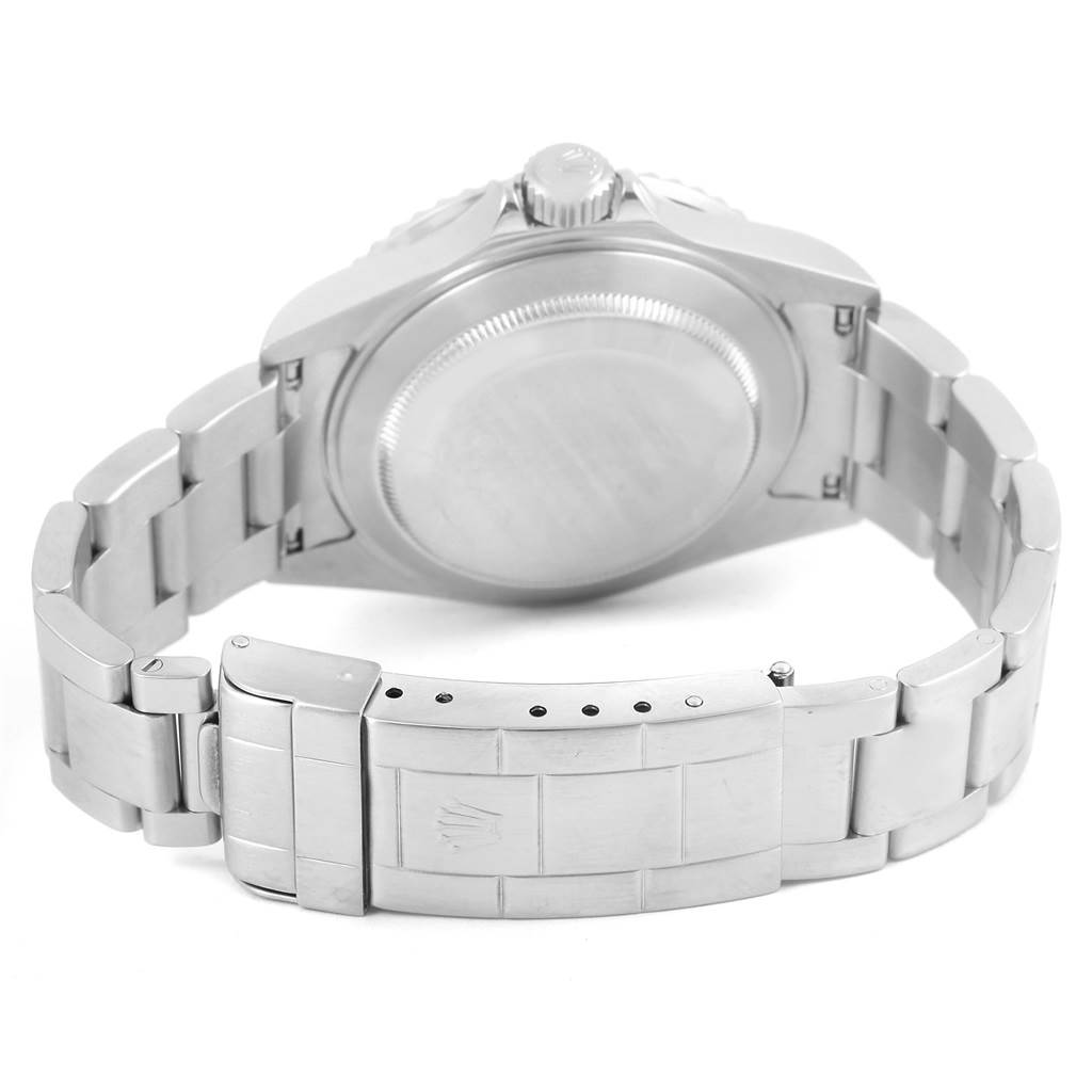 This image shows the back case, crown, and bracelet clasp of the Rolex Submariner 16610 Men
s Stainless Steel Black Dial 16610 Men
s Stainless Steel Black Dial watch.