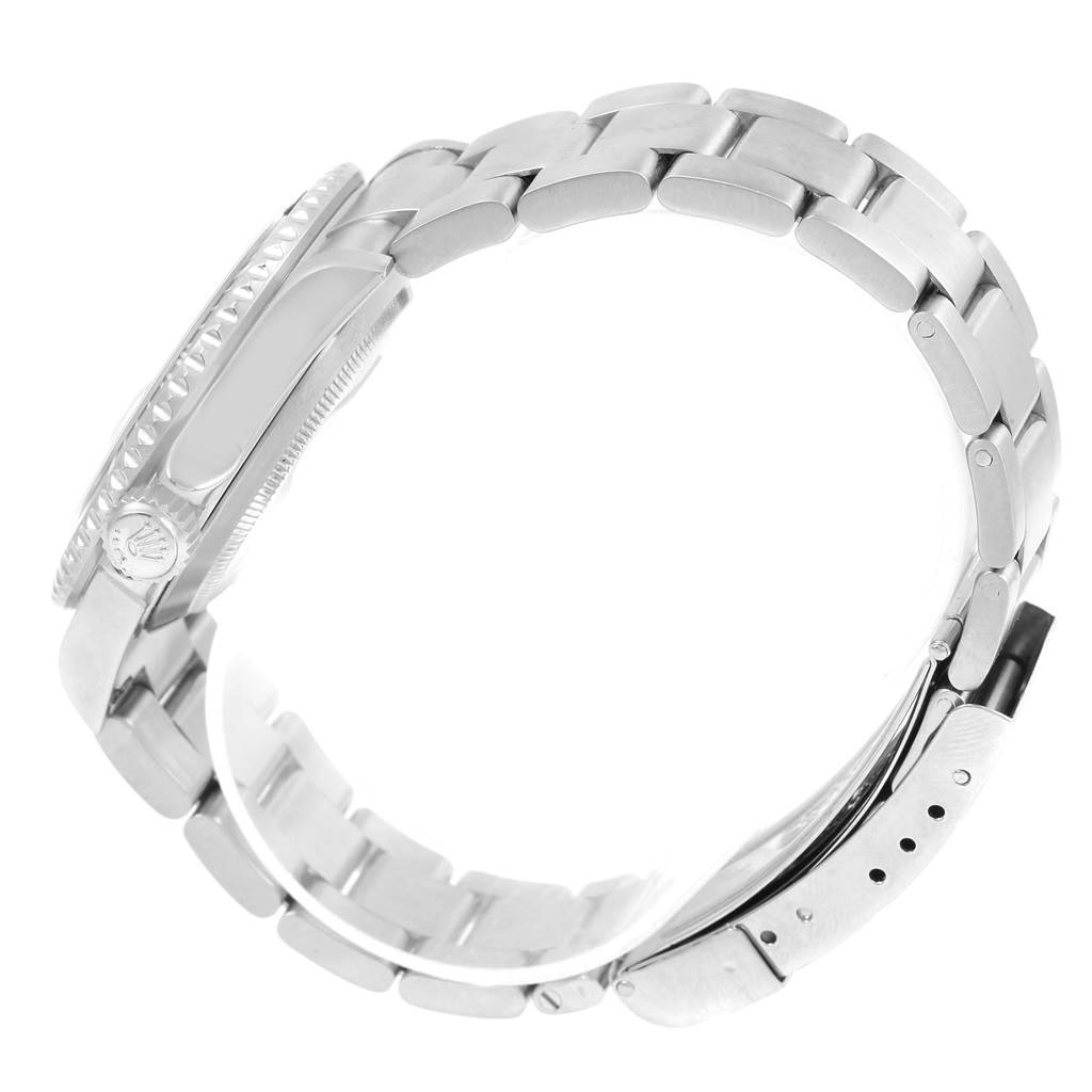 The image shows the side profile of a Rolex Submariner 16610 Men's Stainless Steel Black Dial 16610 Men's Stainless Steel Black Dial watch, highlighting the bracelet, clasp, and case with crown.