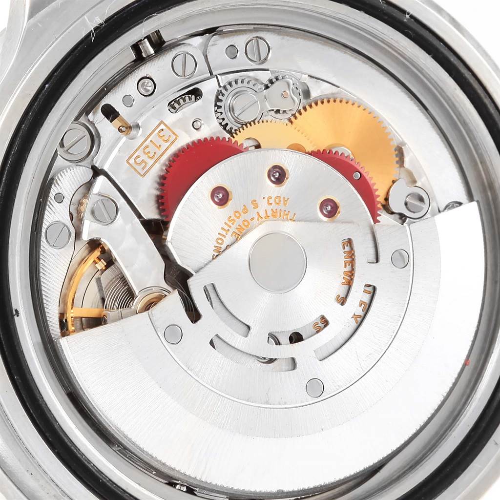 This image shows the internal mechanical movement of a Rolex Submariner 16610 Men's Stainless Steel Black Dial 16610 Men's Stainless Steel Black Dial watch from a back angle.