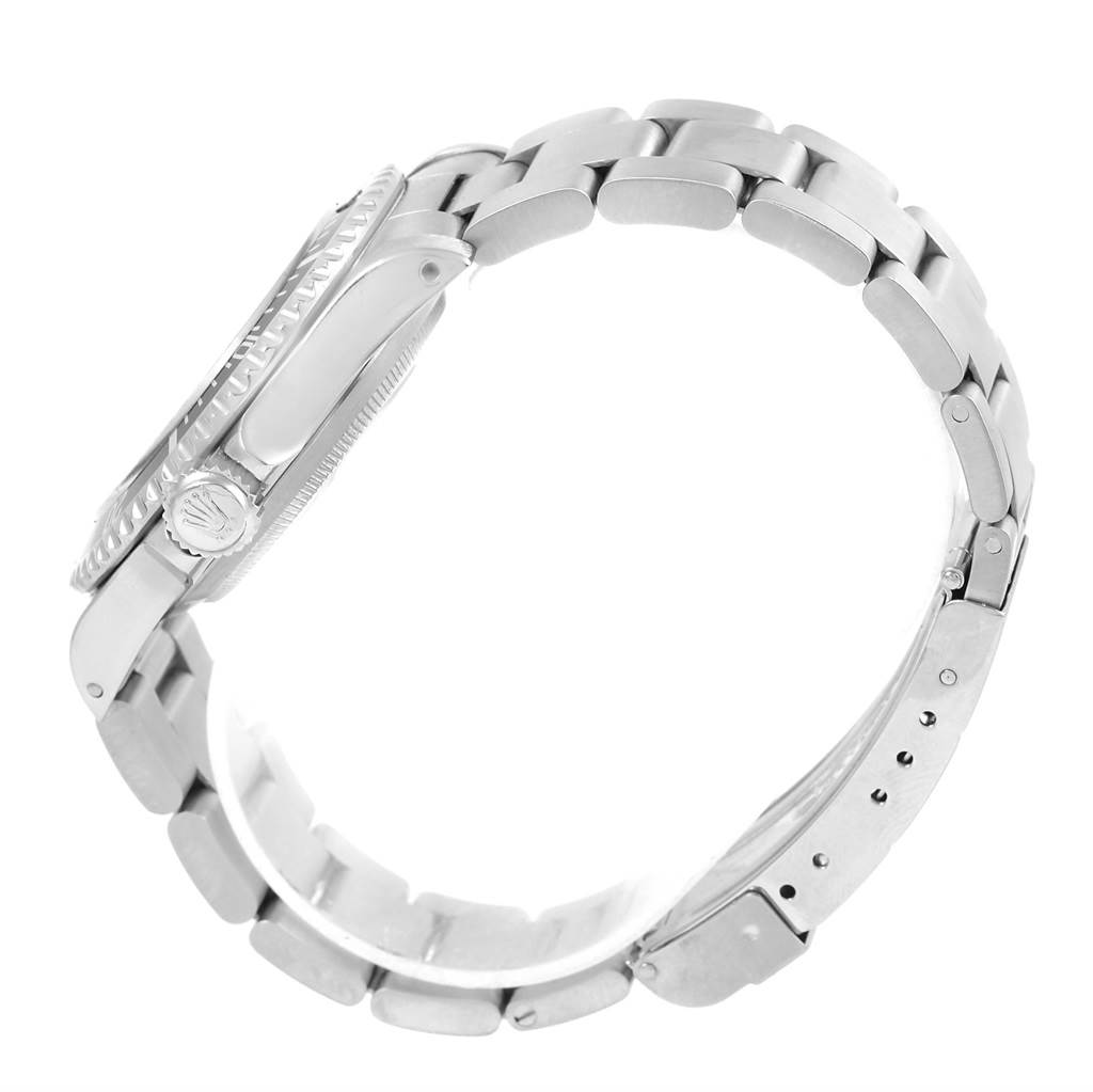 This image shows a side profile of a Rolex Submariner 14060 Men's Stainless Steel Black Dial 14060 Men's Stainless Steel Black Dial watch, focusing on the bracelet and crown.