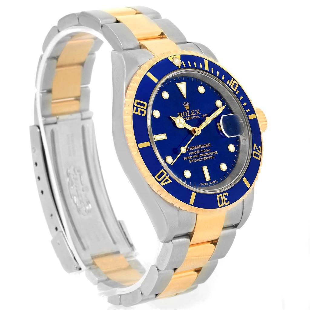 The Rolex Submariner 16613 Men's Steel and Gold (two tone) Blue Dial 16613 Men's Steel and Gold (two tone) Blue Dial watch is shown at a three-quarter angle, highlighting the blue dial, bezel, and two-tone bracelet.