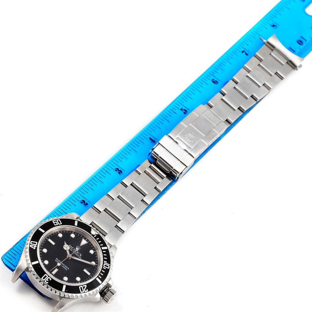 The image shows a Rolex Submariner 14060 Men's Stainless Steel Black Dial 14060 Men's Stainless Steel Black Dial watch laid flat, with the dial, bezel, bracelet, and clasp in view.