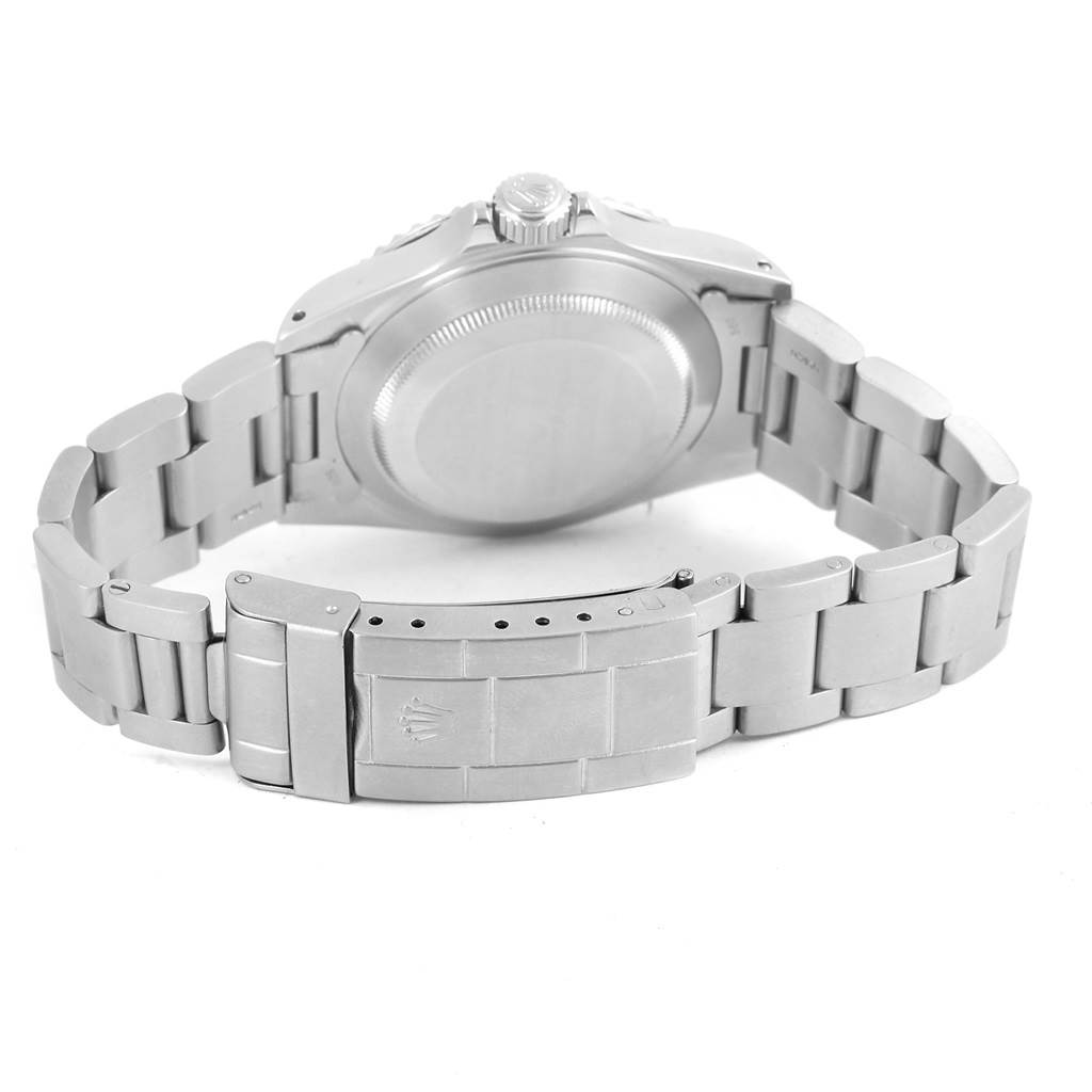 The image shows the back view of a Rolex Submariner 14060 Men's Stainless Steel Black Dial 14060 Men's Stainless Steel Black Dial watch, focusing on the bracelet, caseback, and clasp.