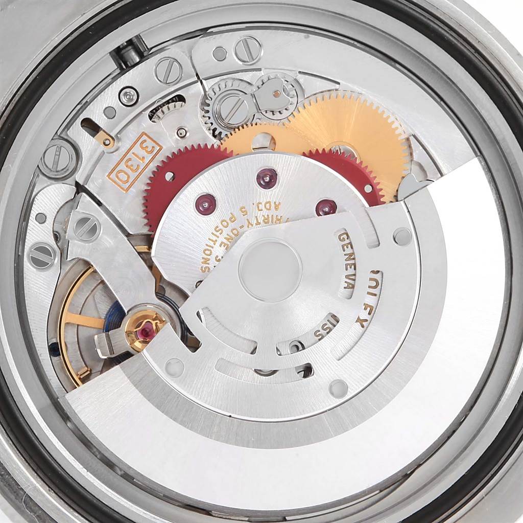 This image shows the intricate internal mechanism and movement of a Rolex Submariner 114060 Men's Stainless Steel Black Dial 114060 Men's Stainless Steel Black Dial watch from a close-up angle.