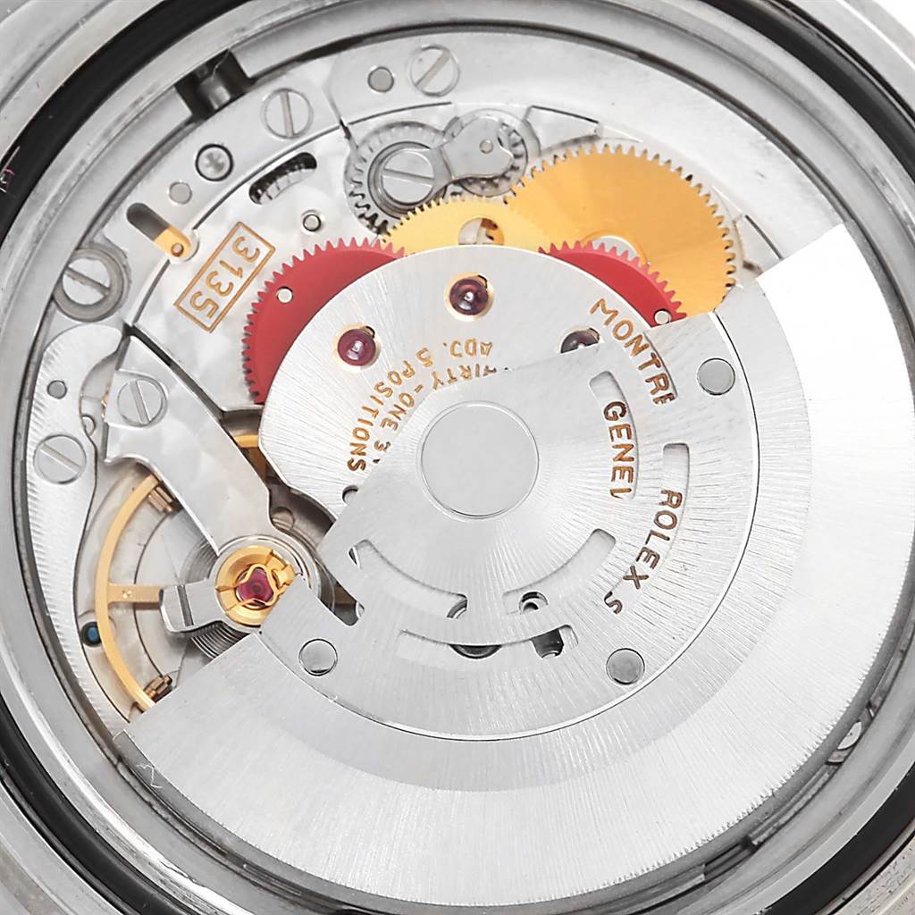 The image shows the internal mechanical movement parts of a Rolex Submariner 16610 Men's Stainless Steel Black Dial 16610 Men's Stainless Steel Black Dial watch at a close-up angle.