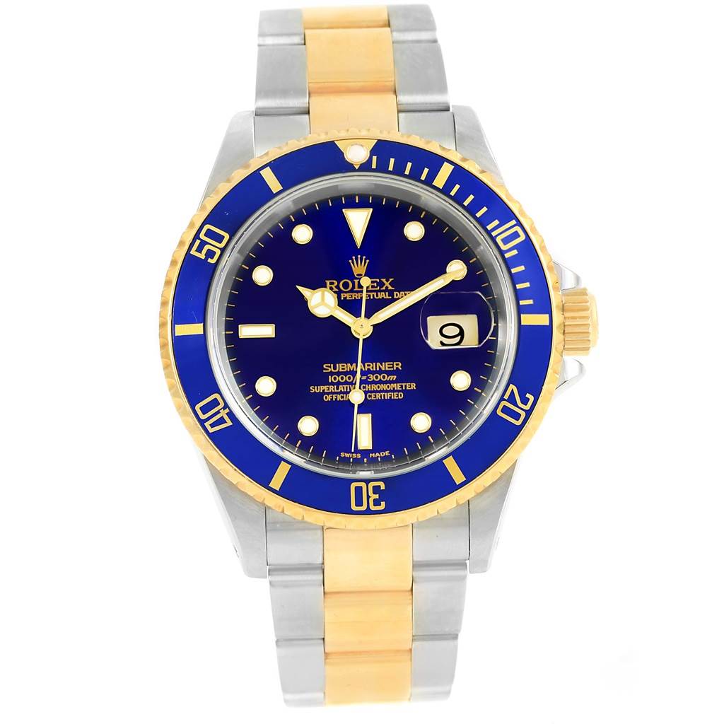The image shows a front view of a Rolex Submariner 16613 Men's Steel and Gold (two tone) Blue Dial 16613 Men's Steel and Gold (two tone) Blue Dial watch with a blue dial, date display, and two-tone metal bracelet.