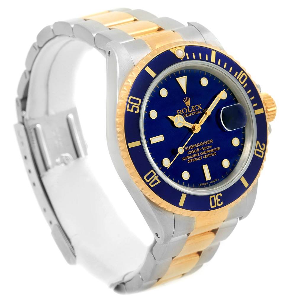 The image shows a Rolex Submariner 16803 Men's Steel and Gold (two tone) Blue Dial 16803 Men's Steel and Gold (two tone) Blue Dial watch from an angled view, highlighting the dial, bezel, and two-tone bracelet.