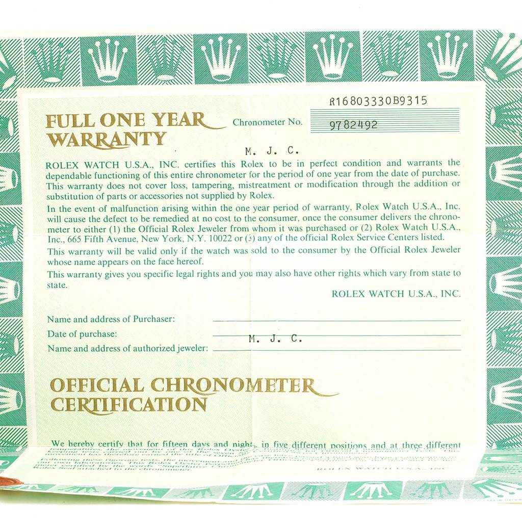 The image shows the full warranty card for a Rolex Submariner 16803 Men's Steel and Gold (two tone) Blue Dial 16803 Men's Steel and Gold (two tone) Blue Dial, featuring the brand's crown logo and warranty terms.