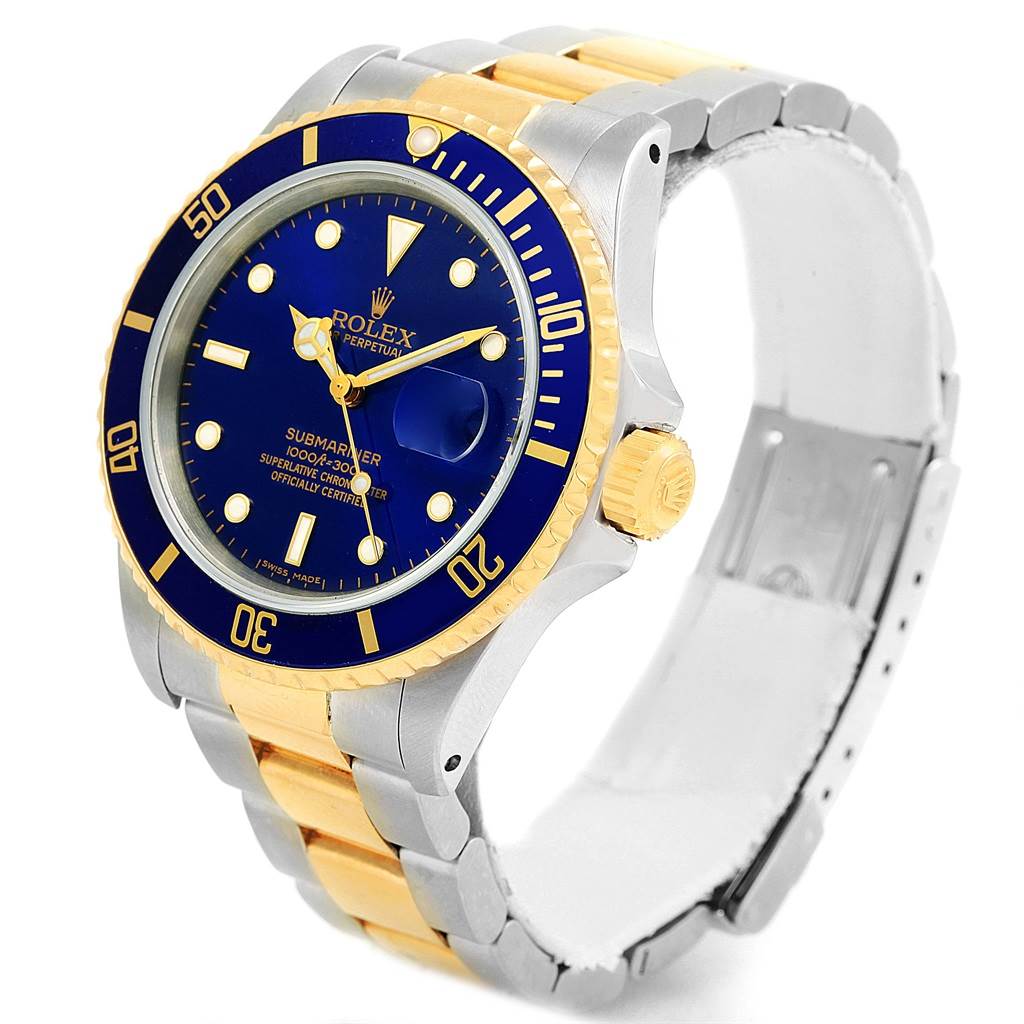 The Rolex Submariner 16803 Men's Steel and Gold (two tone) Blue Dial 16803 Men's Steel and Gold (two tone) Blue Dial watch is shown at a three-quarter angle, highlighting the dial, bezel, case, and bracelet.