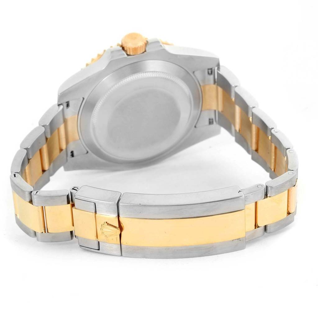 The image shows the back case and bracelet of a Rolex Submariner 116613 Men's Steel and Gold (two tone) Blue Dial 116613 Men's Steel and Gold (two tone) Blue Dial, focusing on its two-tone gold and stainless steel design.