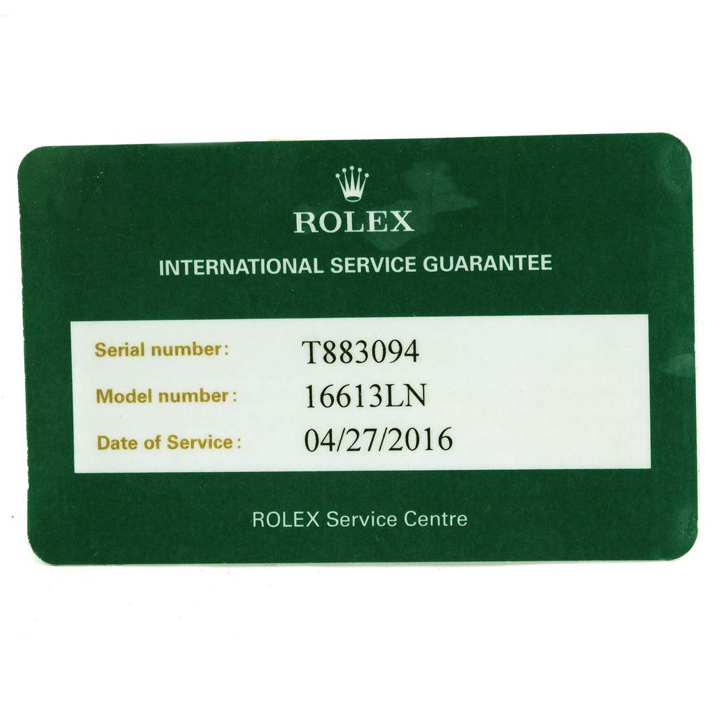 This image shows a Rolex Submariner 16613 Men
s Steel and Gold (two tone) Black Dial 16613 Men
s Steel and Gold (two tone) Black Dial model guarantee card, detailing the serial number, model number 16613LN, and service date.