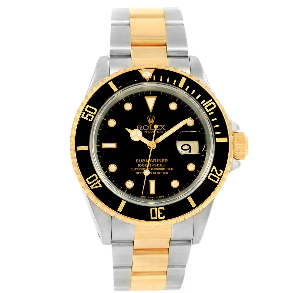 This Rolex Submariner 16613 Men
s Steel and Gold (two tone) Black Dial 16613 Men
s Steel and Gold (two tone) Black Dial watch is shown from a front angle, displaying its dial, bezel, and two-tone bracelet.