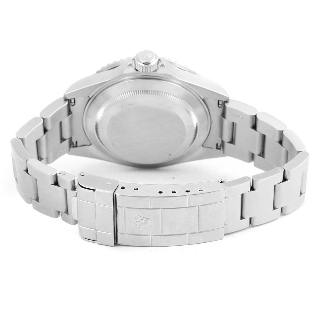 The image shows the backside and bracelet of a Rolex Submariner 16610 Men's Stainless Steel Black Dial 16610 Men's Stainless Steel Black Dial watch, highlighting the clasp and case back.