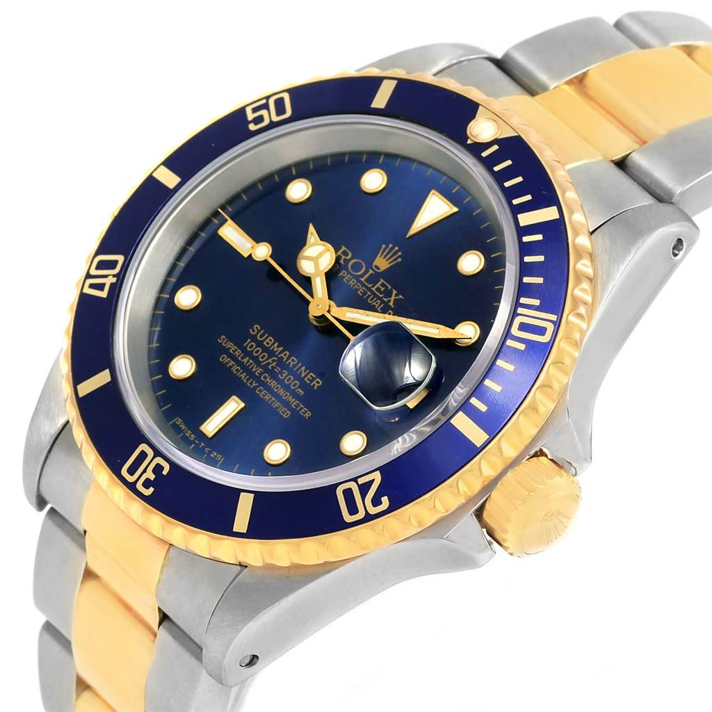 The image shows a side angle of a Rolex Submariner 16613 Men's Steel and Gold (two tone) Blue Dial 16613 Men's Steel and Gold (two tone) Blue Dial watch, highlighting the bezel, dial, and part of the bracelet.
