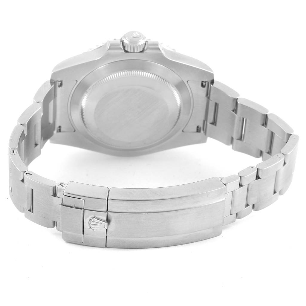 This image shows the back case, crown, and bracelet clasp of a Rolex Submariner 114060 Men's Stainless Steel Black Dial 114060 Men's Stainless Steel Black Dial watch at a rear angle.