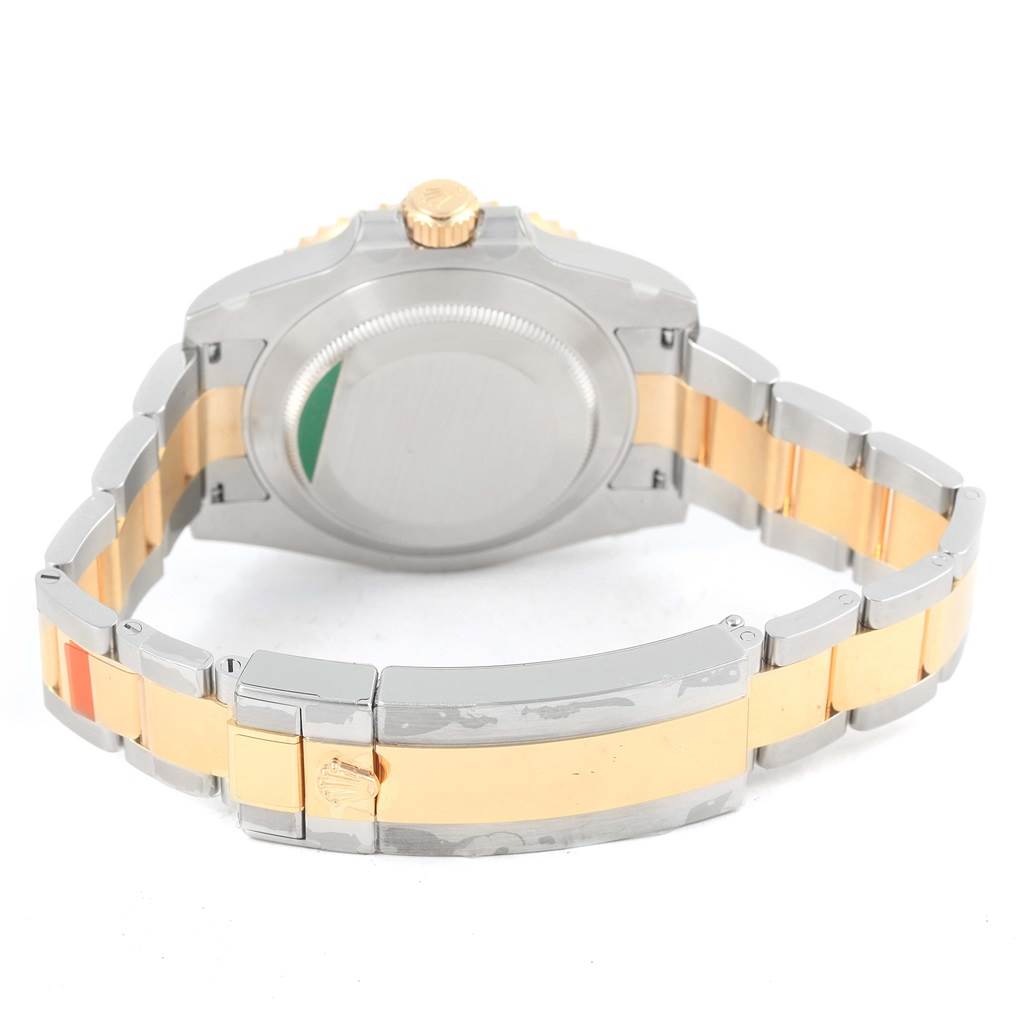 The image shows the back and bracelet of a Rolex Submariner 116613 Men's Steel and Gold (two tone) Blue Dial 116613 Men's Steel and Gold (two tone) Blue Dial watch, displayed horizontally.