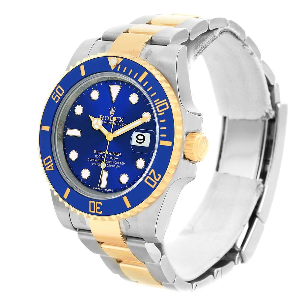 The image shows a Rolex Submariner 116613 Men's Steel and Gold (two tone) Blue Dial 116613 Men's Steel and Gold (two tone) Blue Dial watch at a three-quarter angle, highlighting the face, bezel, and bracelet.
