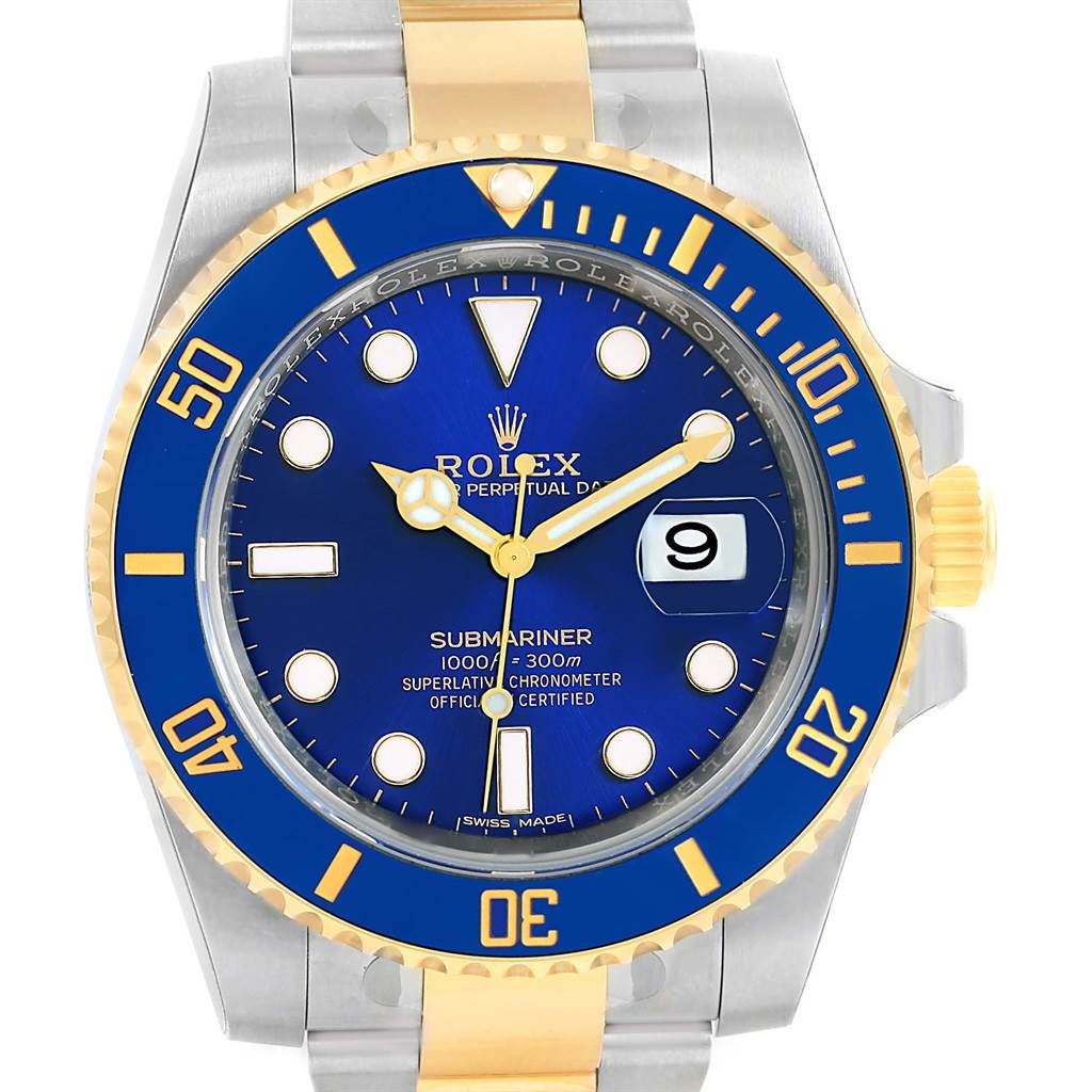 The image shows a front angle of a Rolex Submariner 116613 Men's Steel and Gold (two tone) Blue Dial 116613 Men's Steel and Gold (two tone) Blue Dial watch featuring a blue dial, date display, and a two-tone (gold and silver) bracelet.