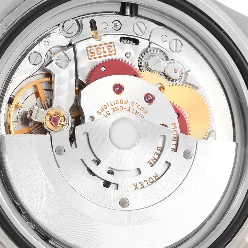 The image shows the intricate internal mechanism of a Rolex Submariner 16613 Men's Steel and Gold (two tone) Black Dial 16613 Men's Steel and Gold (two tone) Black Dial watch, viewed from the back.