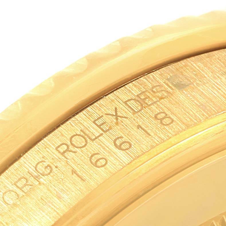 The image shows a close-up of the bezel and engraved inner rim of a Rolex Submariner 16618 Men's Yellow Gold Blue Dial 16618 Men's Yellow Gold Blue Dial watch.