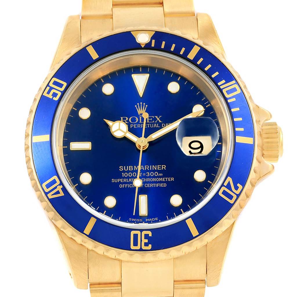 This image shows a frontal view of a Rolex Submariner 16618 Men's Yellow Gold Blue Dial 16618 Men's Yellow Gold Blue Dial watch with a blue dial and matching blue bezel.