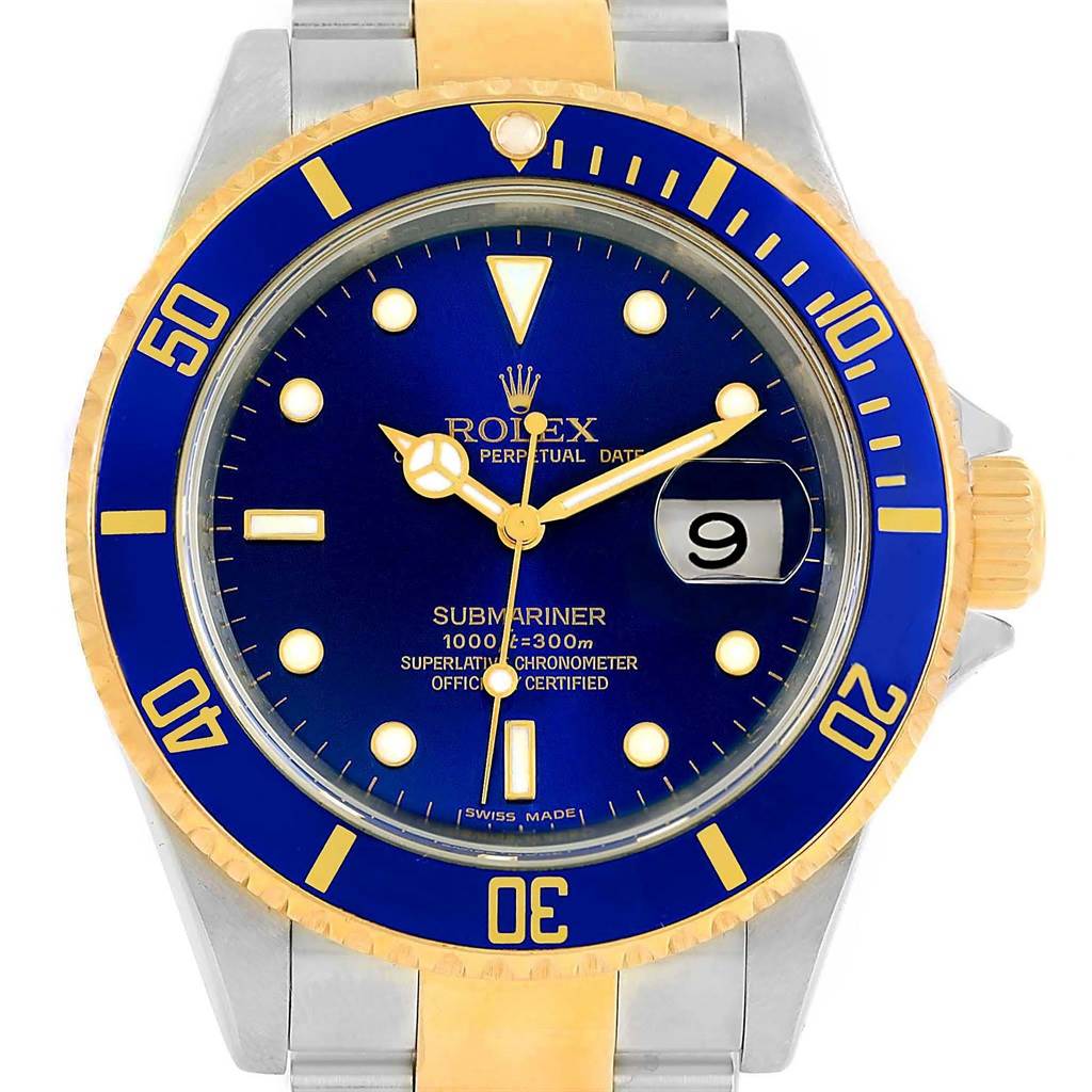 The image shows a front view of the Rolex Submariner 16613 Men's Steel and Gold (two tone) Blue Dial 16613 Men's Steel and Gold (two tone) Blue Dial watch, displaying its blue dial, date window, and bi-color bezel and bracelet.