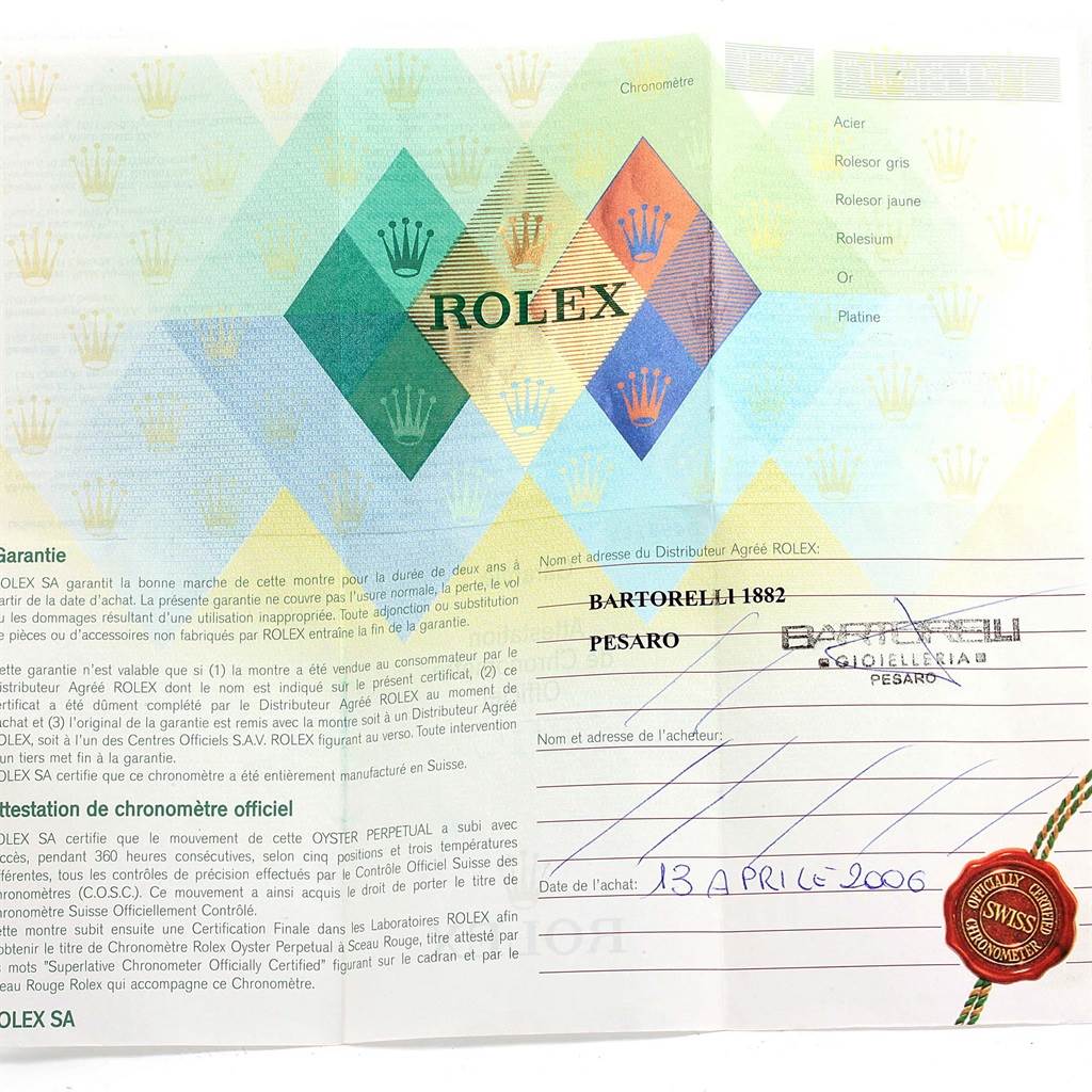 This image shows a Rolex Submariner 16613 Men's Steel and Gold (two tone) Blue Dial 16613 Men's Steel and Gold (two tone) Blue Dial model warranty certificate, including holographic details and purchase information.