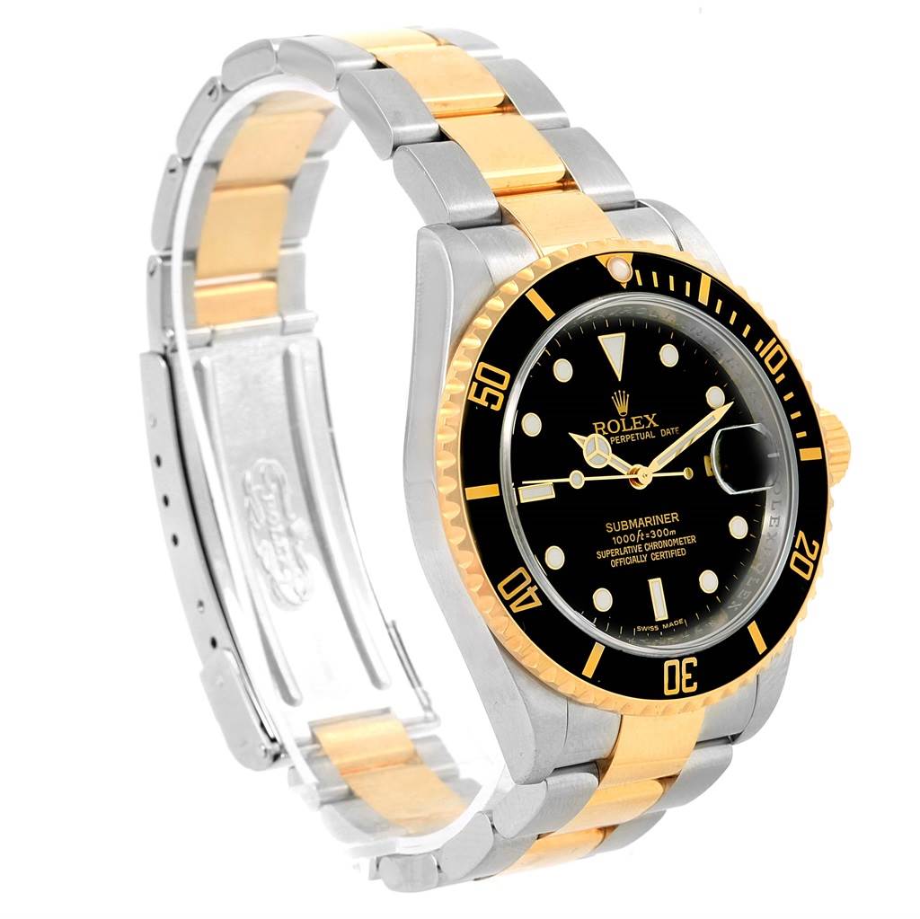 This image shows a Rolex Submariner 16613 Men
s Steel and Gold (two tone) Black Dial 16613 Men
s Steel and Gold (two tone) Black Dial watch at a slight angle displaying its black dial, bezel, and two-tone bracelet.