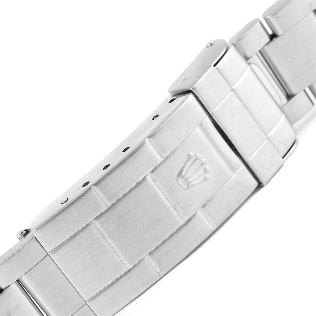 This image shows a close-up of the clasp and part of the bracelet of a Rolex Submariner 16610 Men's Stainless Steel Black Dial 16610 Men's Stainless Steel Black Dial watch.