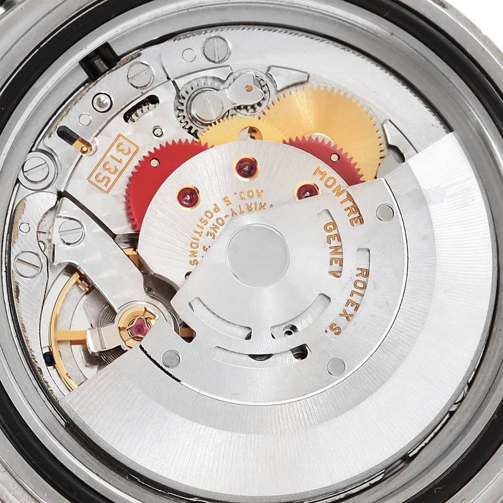 This image shows the internal mechanical movement of the Rolex Submariner 16610LV Men's Stainless Steel Black Dial 16610LV Men's Stainless Steel Black Dial watch with visible gears and rotor.