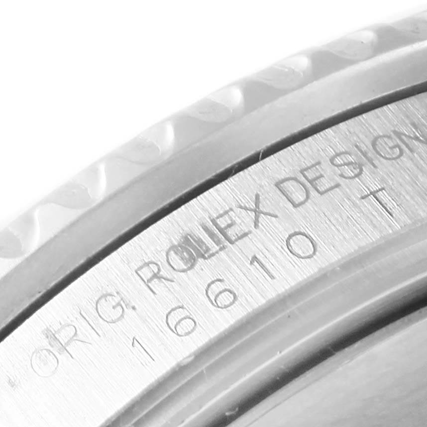 This close-up photo shows the engraved bezel and model number of the Rolex Submariner 16610LV Men's Stainless Steel Black Dial 16610LV Men's Stainless Steel Black Dial, showcasing its detailed design.