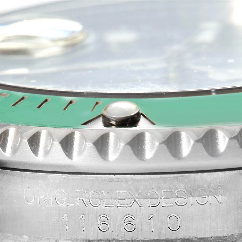 This close-up angle of the Rolex Submariner 116610LV Men
s Stainless Steel Green Dial 116610LV Men
s Stainless Steel Green Dial shows the watch
s bezel, the edge of the crystal, and its model engraving "116610".