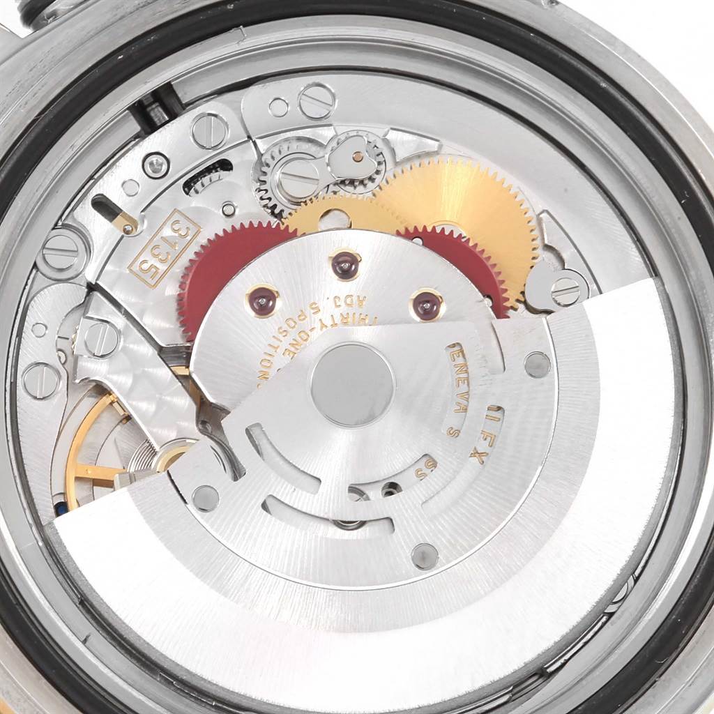 This image shows the internal mechanical movement of a Rolex Submariner 16613 Men's Steel and Gold (two tone) Blue Dial 16613 Men's Steel and Gold (two tone) Blue Dial watch from a back view angle.