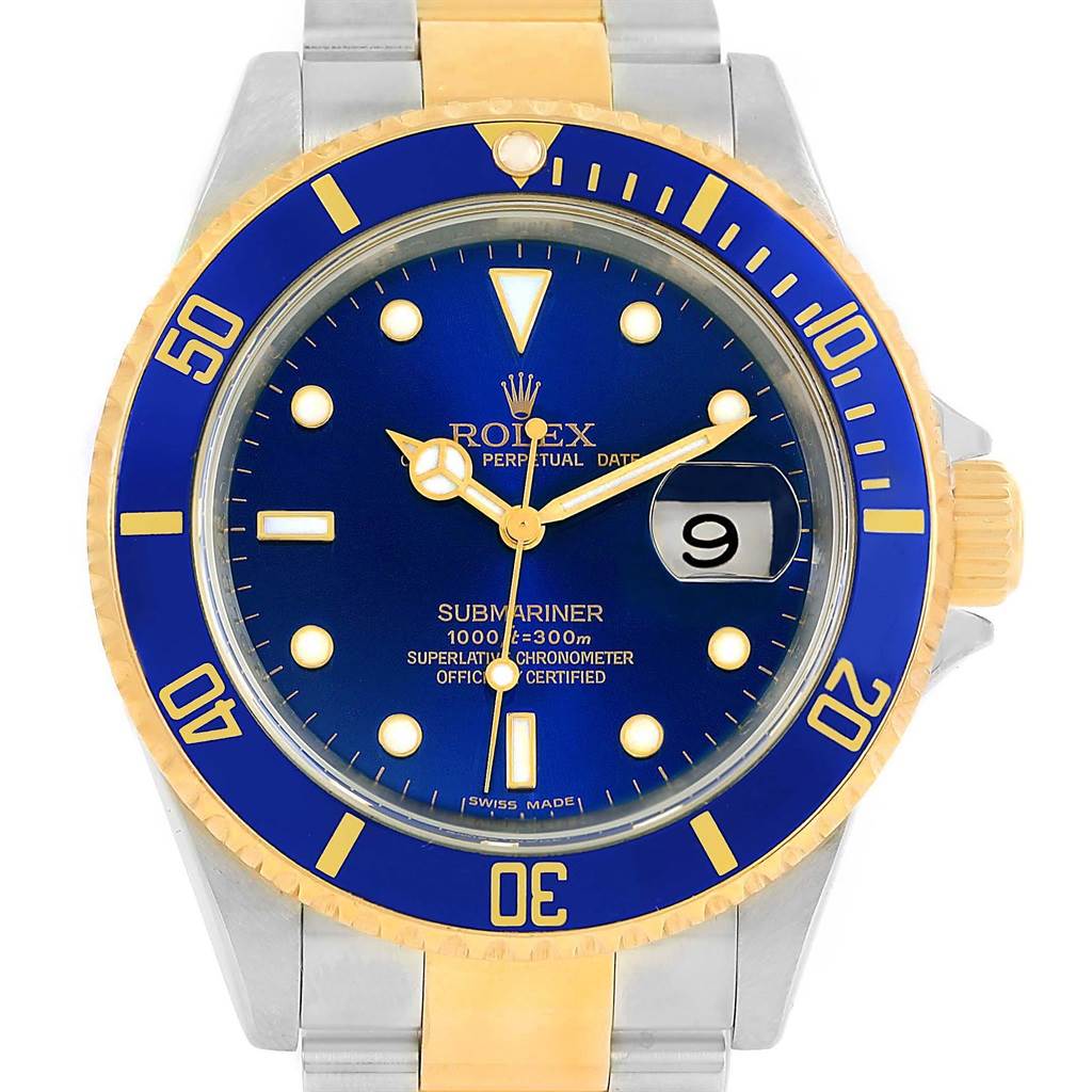 This image shows the front view of a Rolex Submariner 16613 Men's Steel and Gold (two tone) Blue Dial 16613 Men's Steel and Gold (two tone) Blue Dial watch, displaying the dial, bezel, and part of the bracelet.