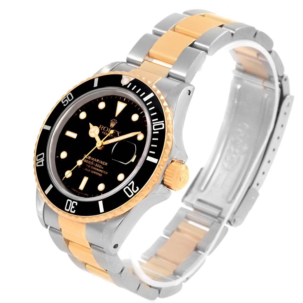 The image shows a Rolex Submariner 16803 Men's Steel and Gold (two tone) Black Dial 16803 Men's Steel and Gold (two tone) Black Dial watch at a three-quarter angle, displaying its bezel, dial, crown, and two-tone bracelet.