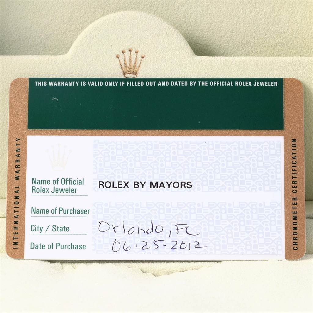 This image shows a Rolex international warranty card for a Rolex Submariner 114060 Men's Stainless Steel Black Dial 114060 Men's Stainless Steel Black Dial watch, indicating the point of purchase and date.