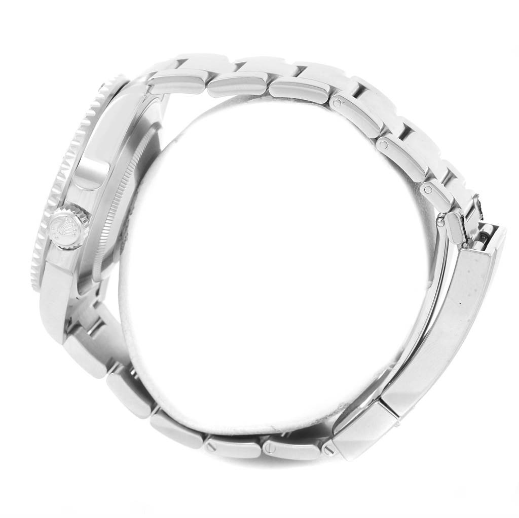 The image shows a side view of a Rolex Submariner 114060 Men's Stainless Steel Black Dial 114060 Men's Stainless Steel Black Dial watch, highlighting its bezel, crown, and bracelet.