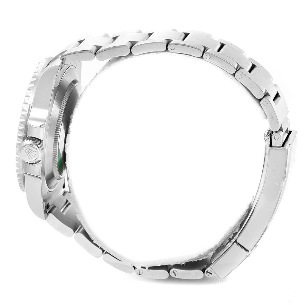 The image shows a side view of the Rolex Submariner 114060 Men's Stainless Steel Black Dial 114060 Men's Stainless Steel Black Dial, highlighting its stainless steel bracelet and crown.