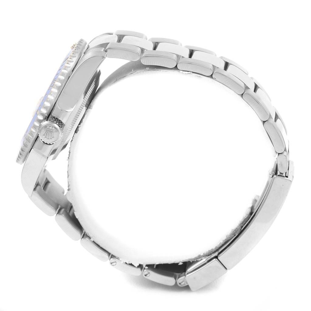 This image shows a side view of the Rolex Submariner 116619 Men's White Gold Blue Dial 116619 Men's White Gold Blue Dial watch, highlighting the crown, bezel, and bracelet.