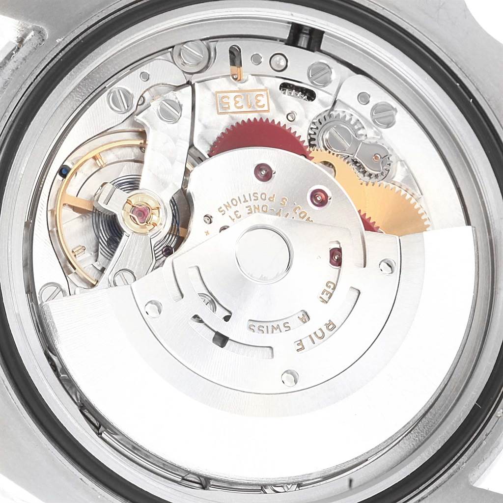 The image shows the internal movement mechanism of a Rolex Submariner 116610LV Men's Stainless Steel Green Dial 116610LV Men's Stainless Steel Green Dial watch from a close-up, back view angle.