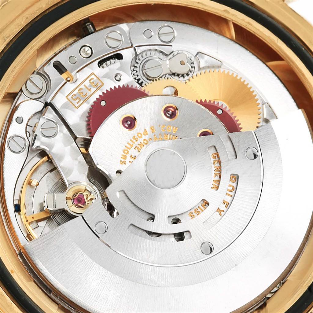 This image shows the internal mechanism and movement parts of a Rolex Submariner 16618 Men's Yellow Gold Blue Dial 16618 Men's Yellow Gold Blue Dial watch from a close-up angle.