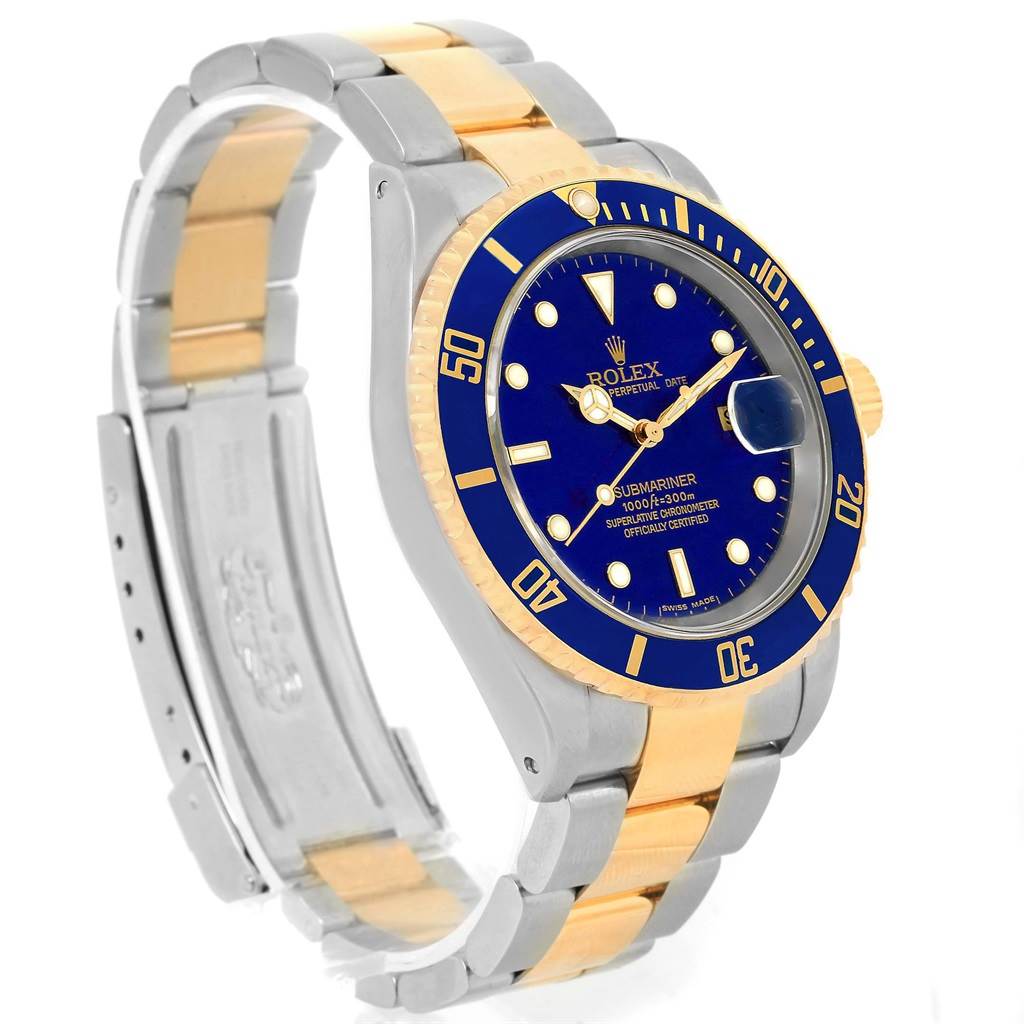 A Rolex Submariner 16613 Men's Steel and Gold (two tone) Blue Dial 16613 Men's Steel and Gold (two tone) Blue Dial watch is shown from an angled side view, highlighting its face, bezel, crown, and two-tone bracelet.