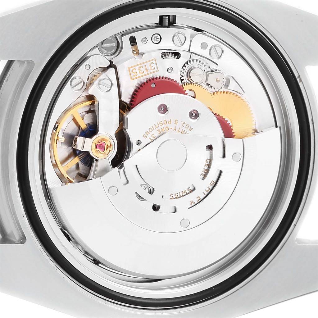 The image shows a close-up view of the movement inside a Rolex Submariner 116610 Men's Stainless Steel Black Dial 116610 Men's Stainless Steel Black Dial watch.