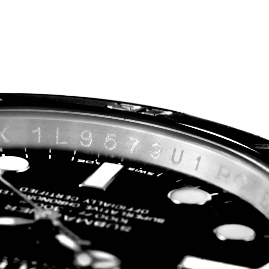This close-up image shows the serial number on the inner bezel of a Rolex Submariner 116610 Men's Stainless Steel Black Dial 116610 Men's Stainless Steel Black Dial watch.